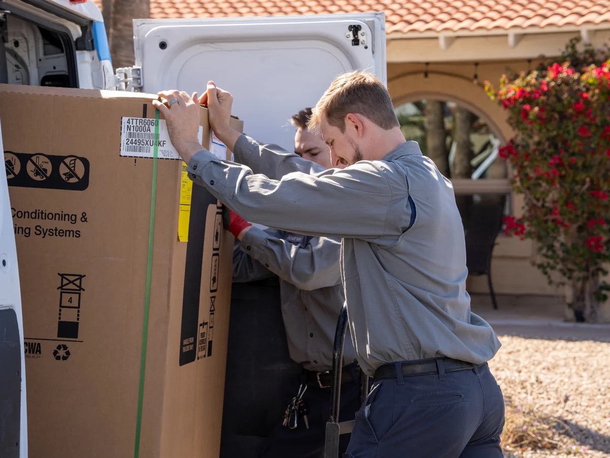 AZ Perfect Comfort crew delivering a new air handler